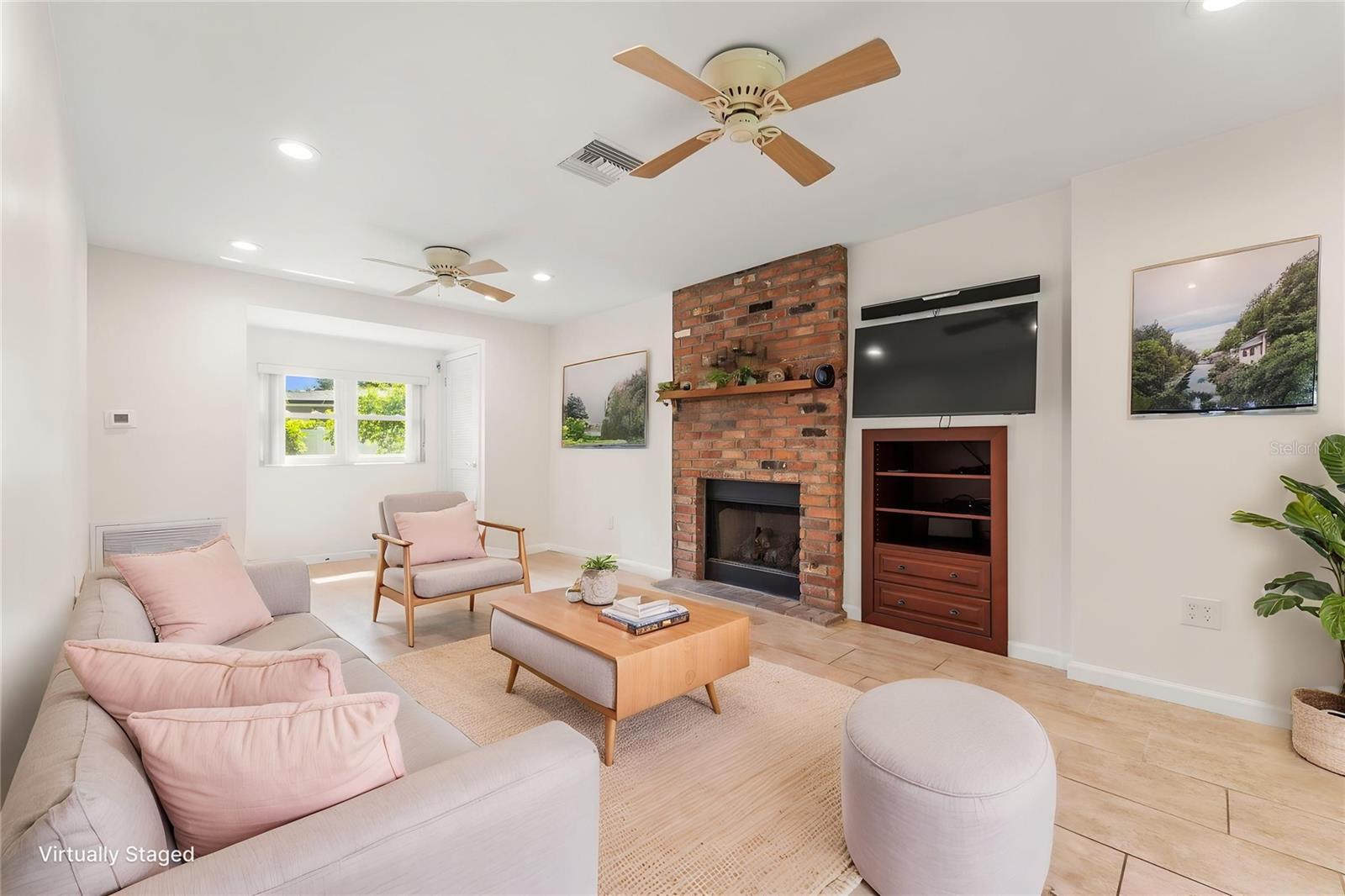 Family room off of kitchen staged