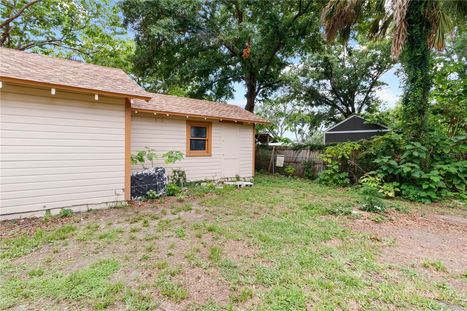 Workshop or storage room behind garage