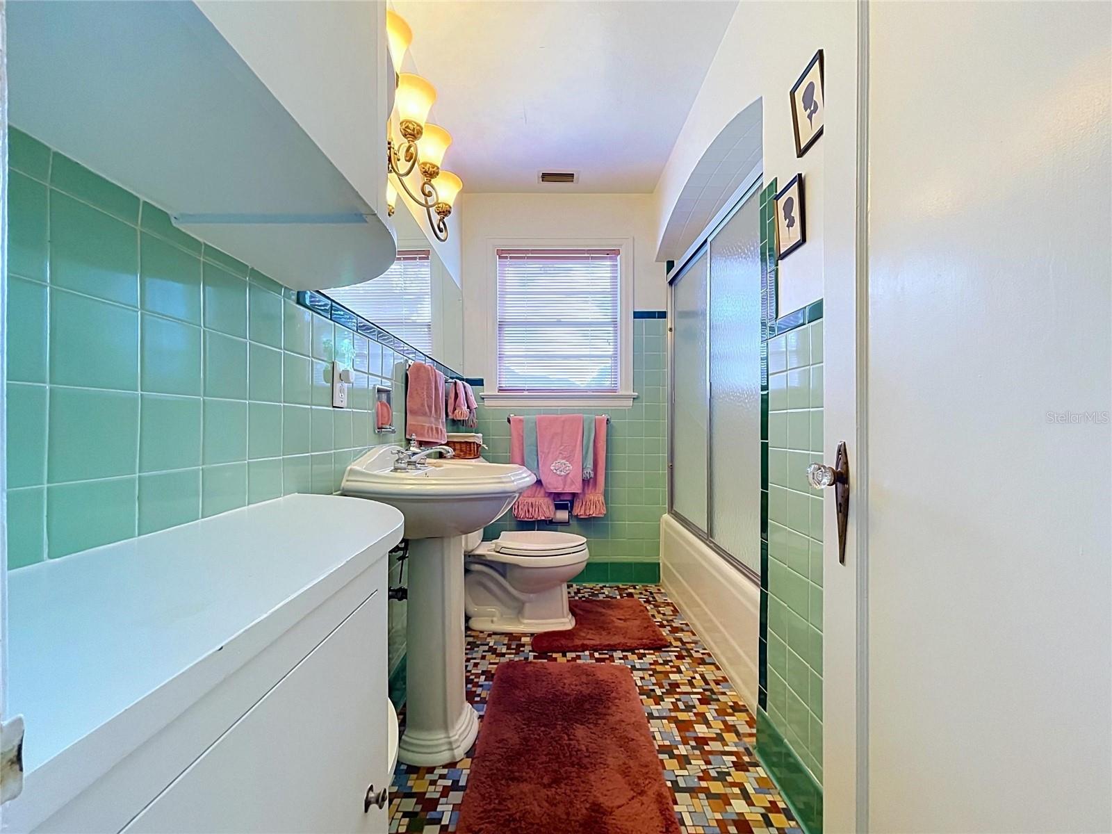 Downstairs main bathroom. Original tile!