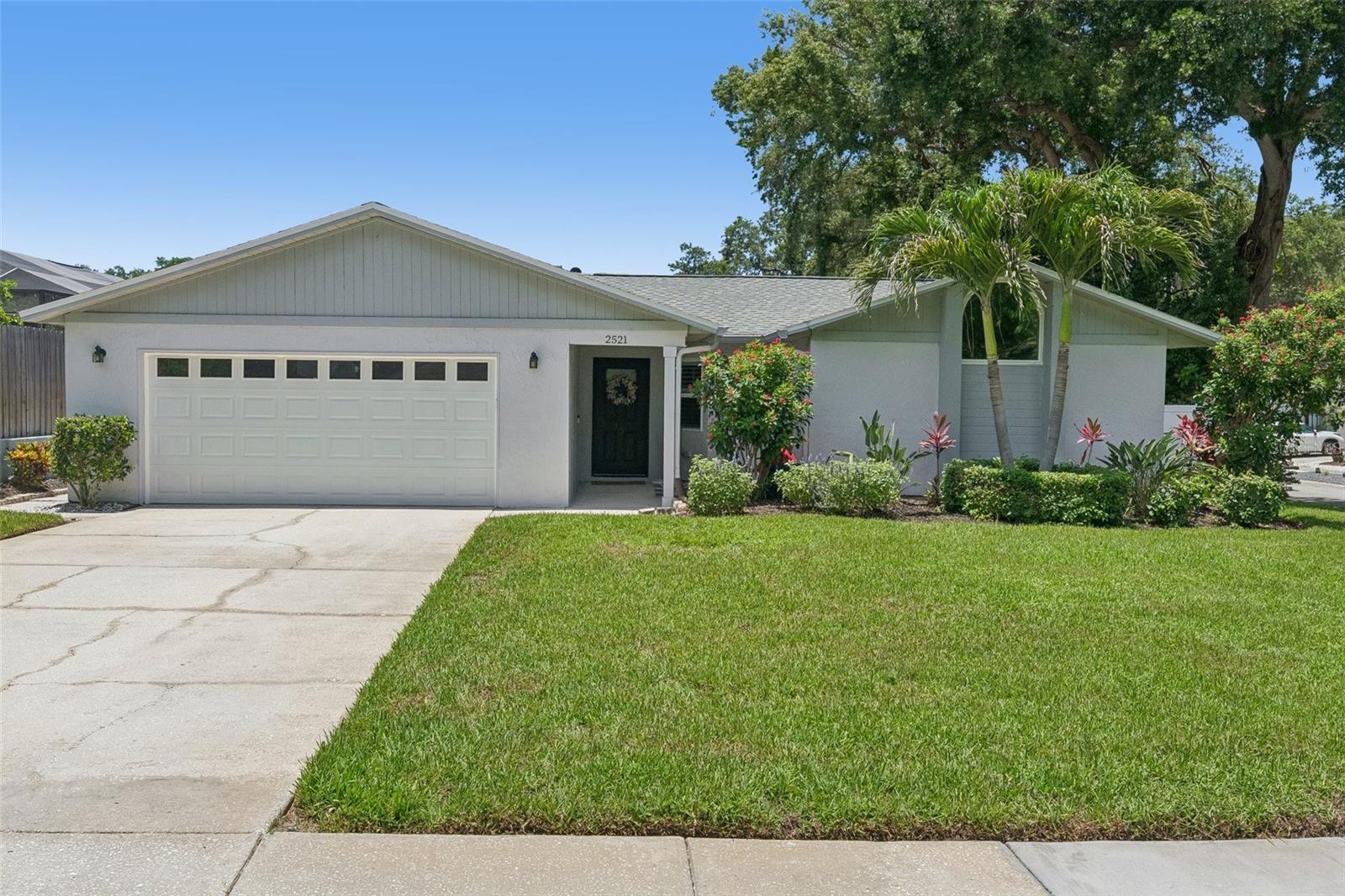 Welcome to 2521 Gulfbreeze Cir on a corner lot in Crystal Beach Estates in Palm Harbor, Florida!