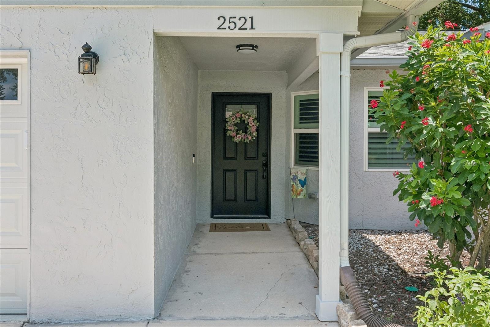 Inviting front covered entry walkway