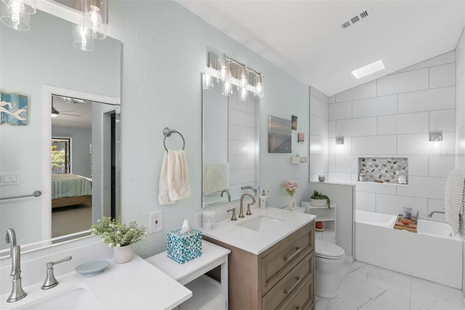 Shower, Soaking Tub, Double Vanities