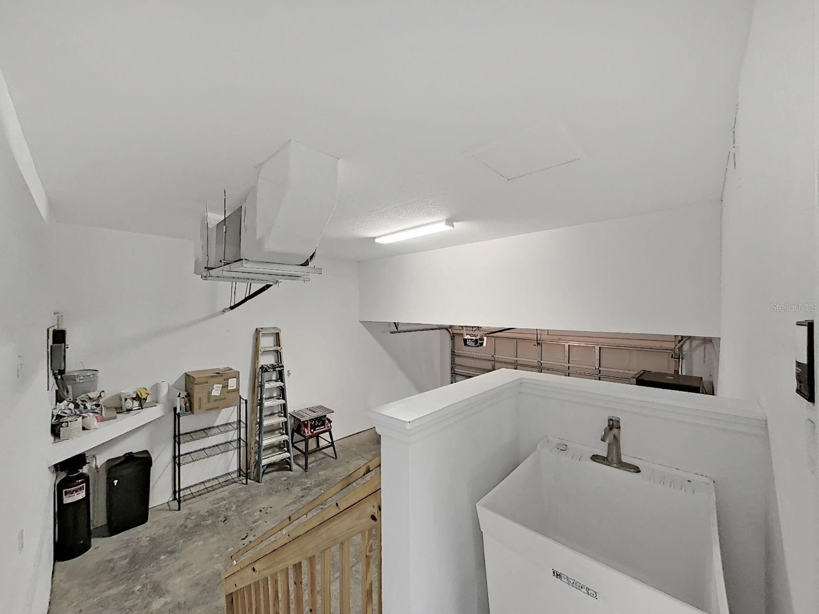 Huge garage with plenty of places to add storage