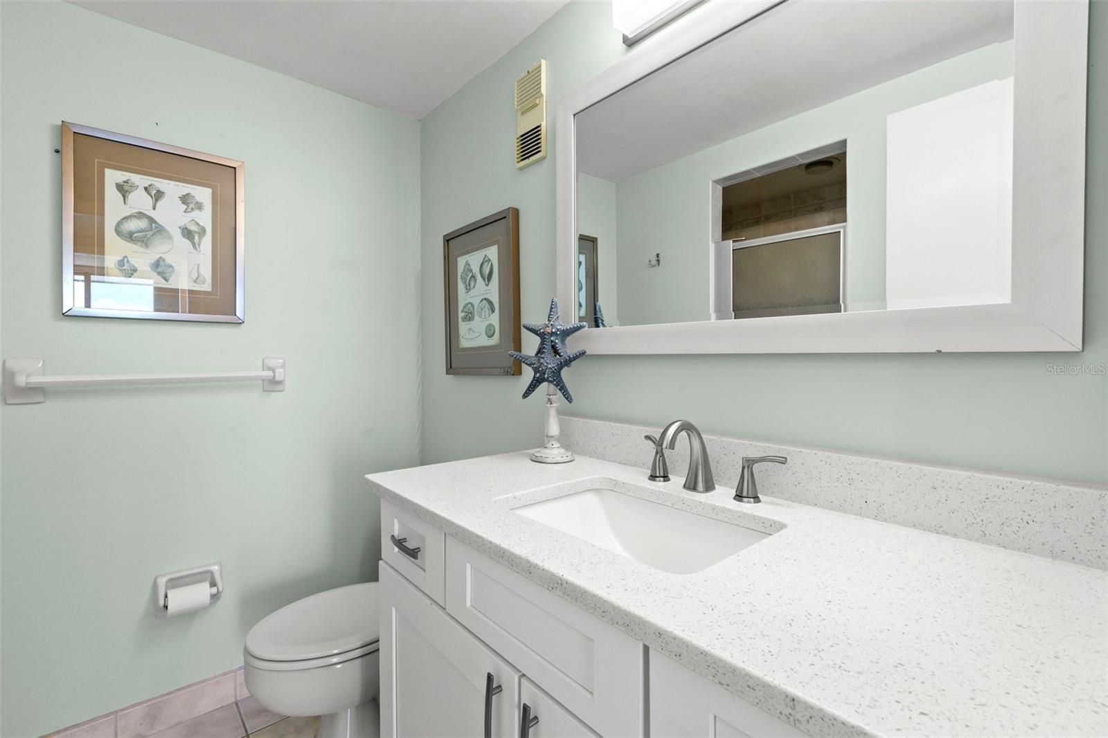 Bedroom 2 ensuite bath with walk in shower.