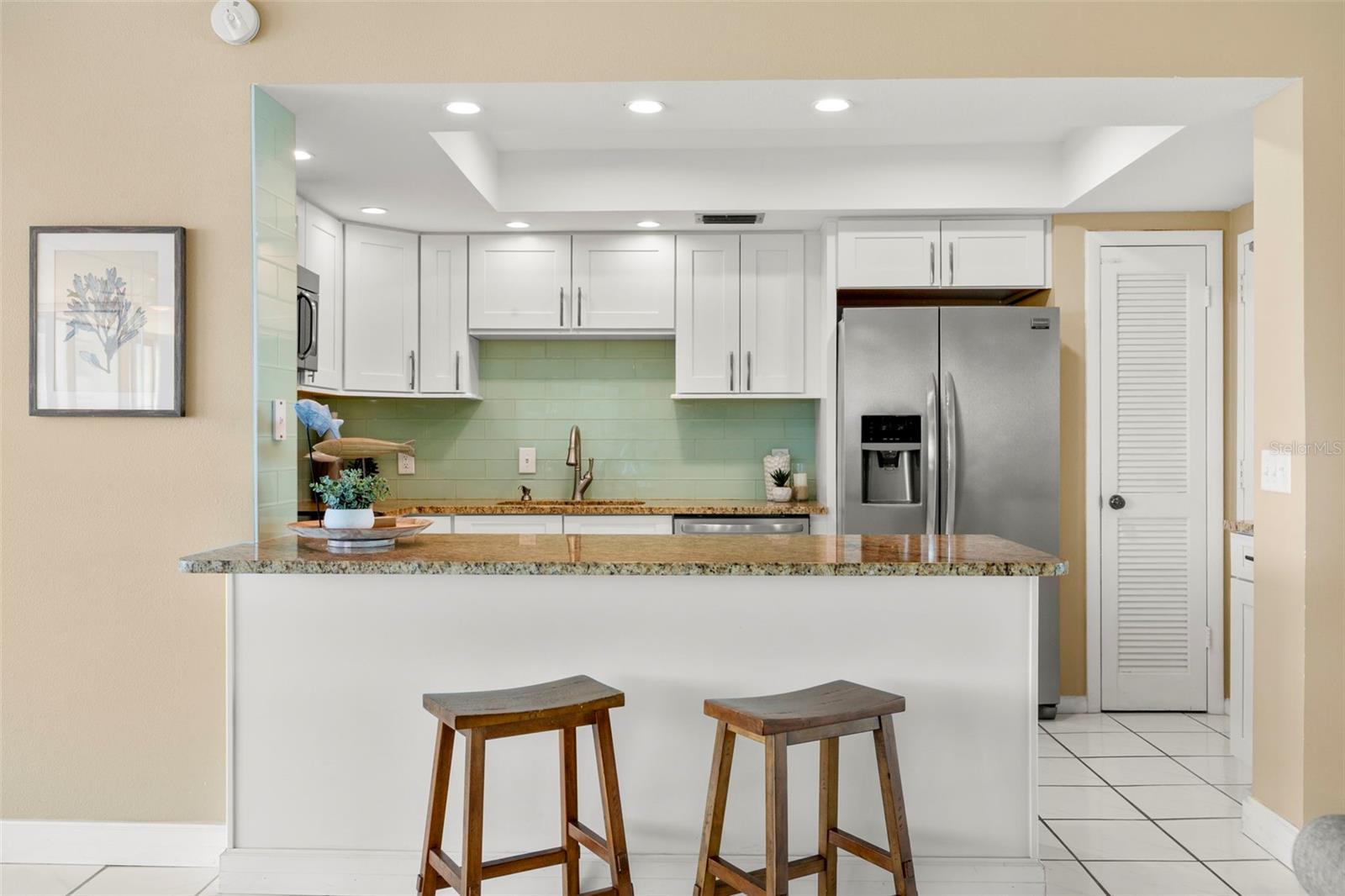 Open kitchen with spacious granite counters