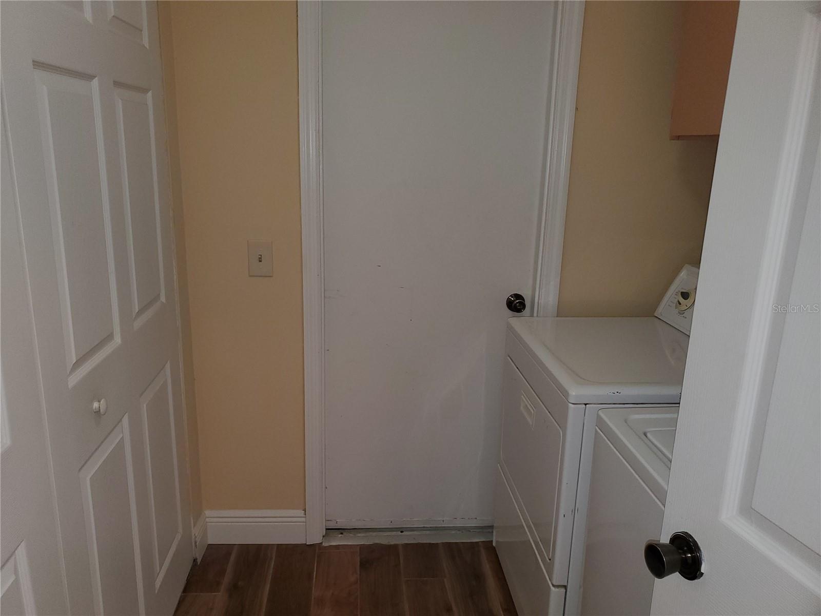 Laundry Room with Built in Closet