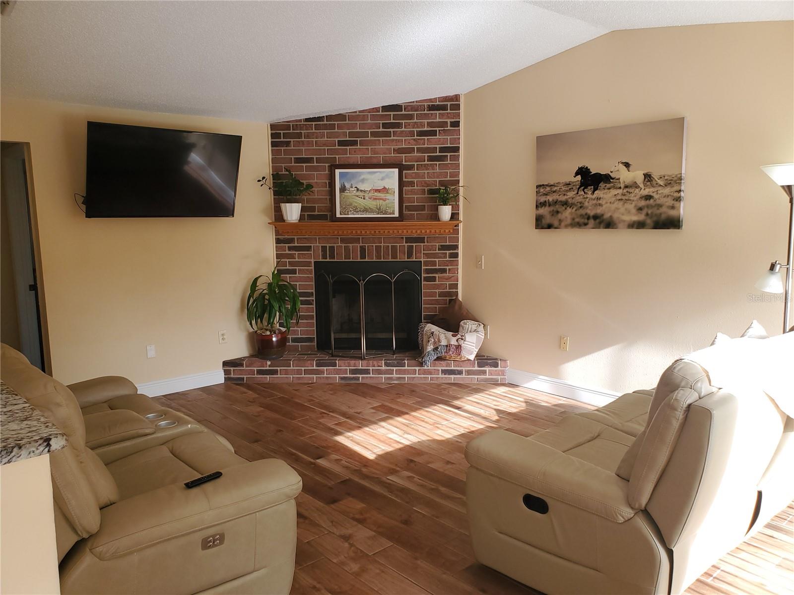Family Room with Wood burning Fireplace