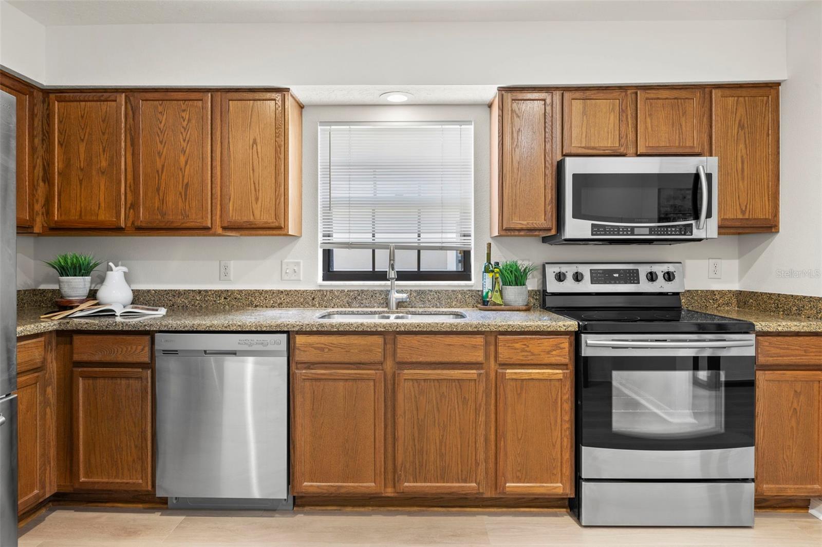 Beautiful appliances and a kitchen with a view