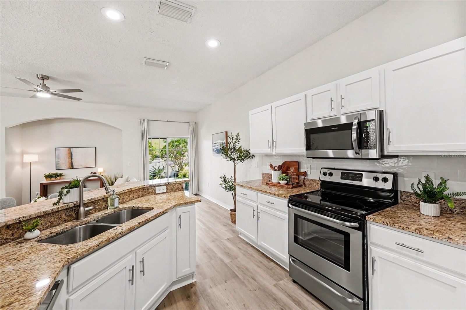 Granite countertops and new backsplash