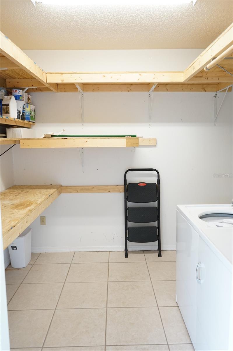 laundry room has shelves