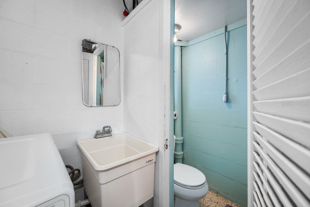 2nd Bathroom is in the Garage - Toilet - Utility Sink and Shower