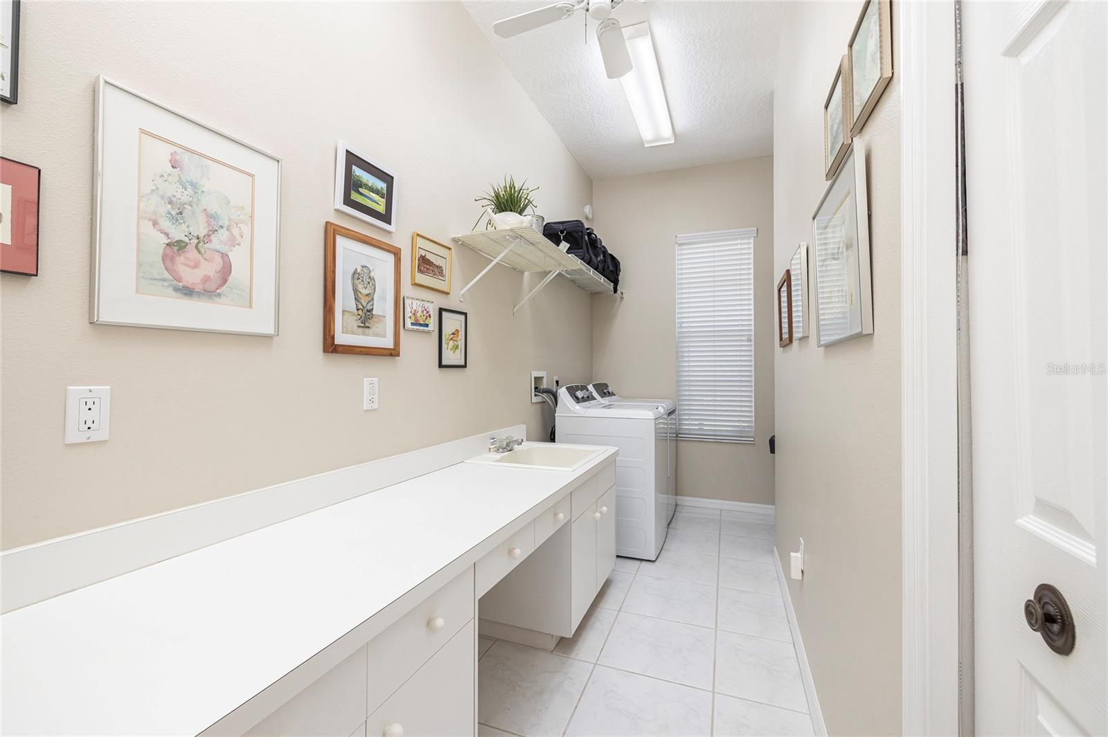 Huge laundry room with extra storage