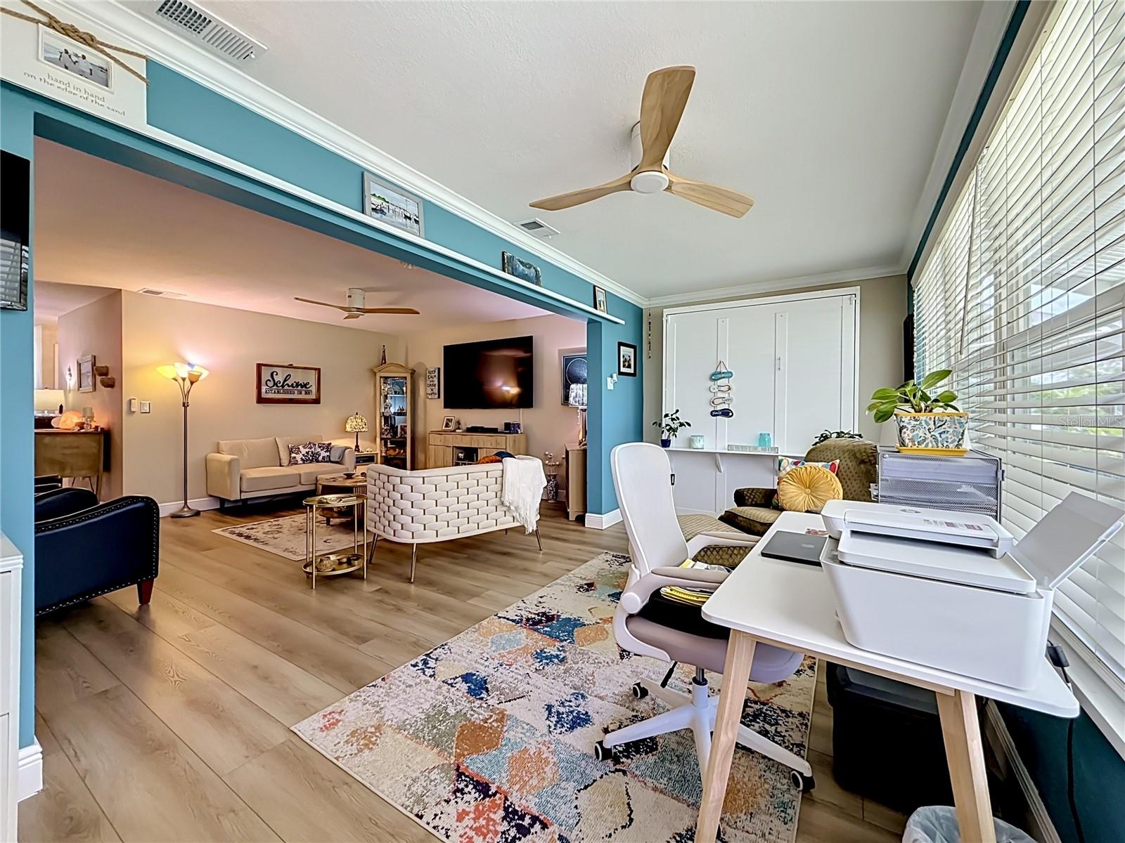 Sunroom/Florida Room with storage closet and queen murphy bed for overnight guests