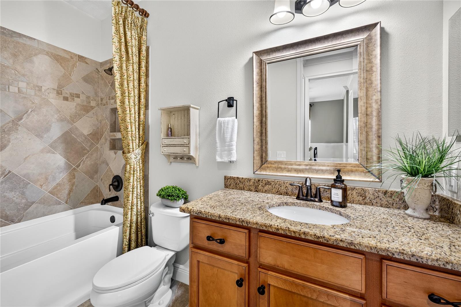 1st floor full bathroom next to one bedroom