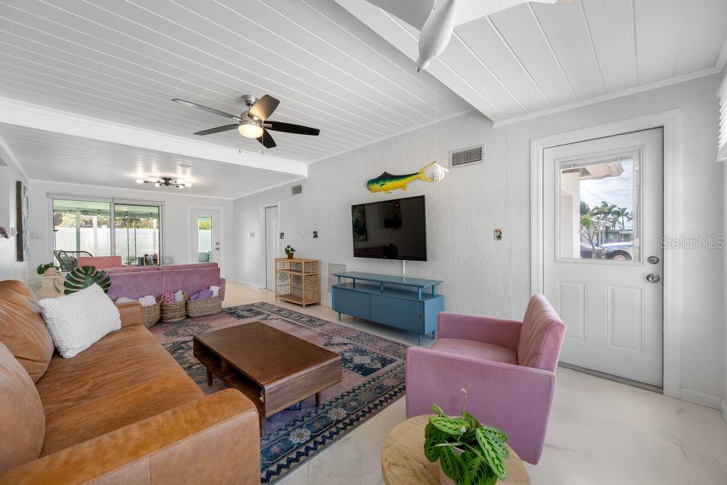 You will love hanging out in the Family Room - Door to the Patio and Driveway are Impact - Door to the Right of the Patio Door is to the Garage