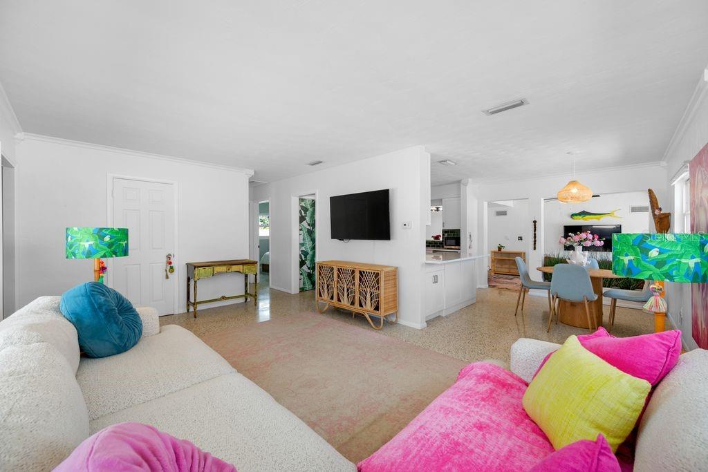 Living Room View - Hallway and Two Bedrooms to the Left - Kitchen and Dining Room to the Right