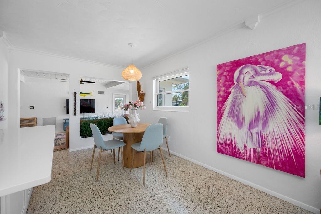 Dining Room View - Kitchen is to the Left and Family Room is Straight Ahead - Terrazzo Floors have been Polished