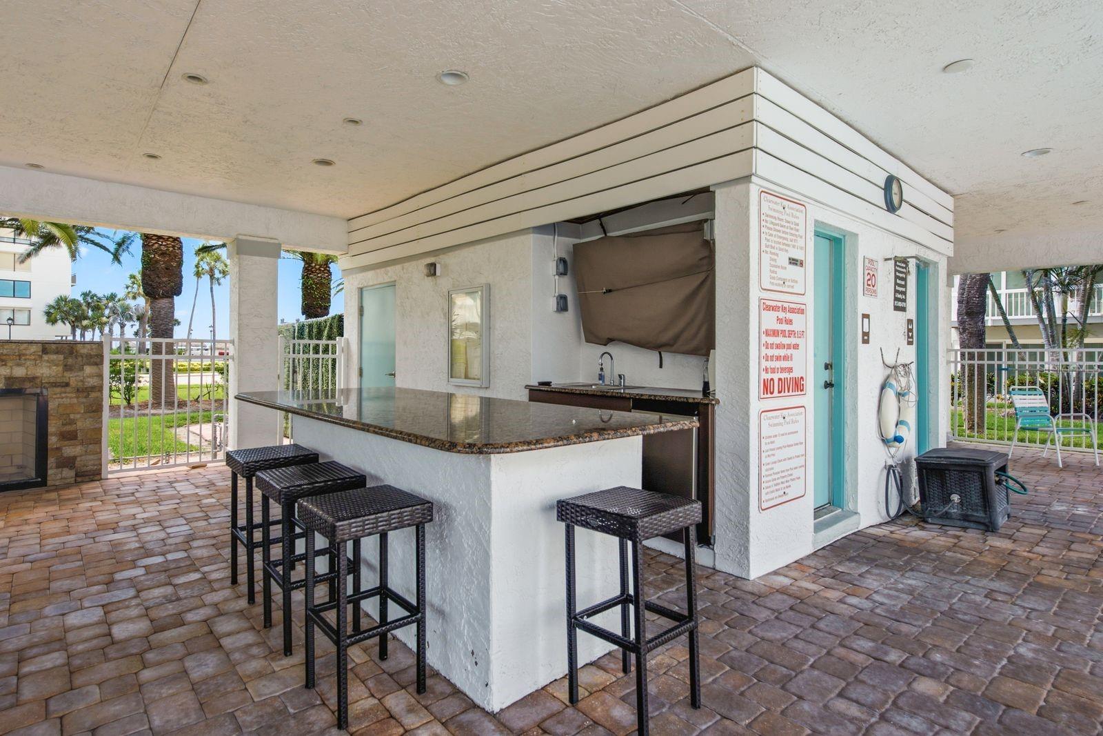 Updated pool and outdoor kitchen with bathrooms