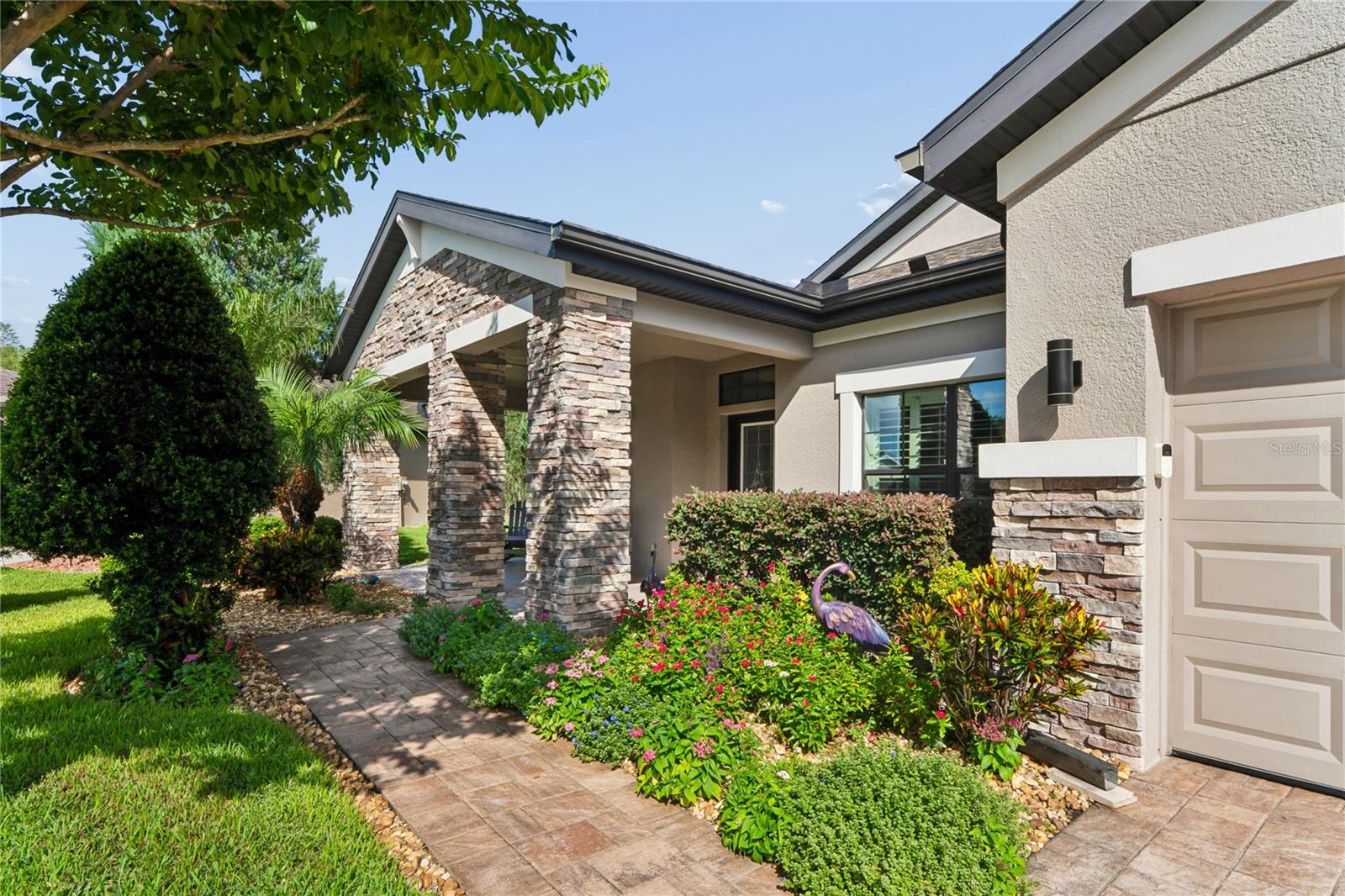 The Paved Walkway Leading to the Front Door Invites You into the Home