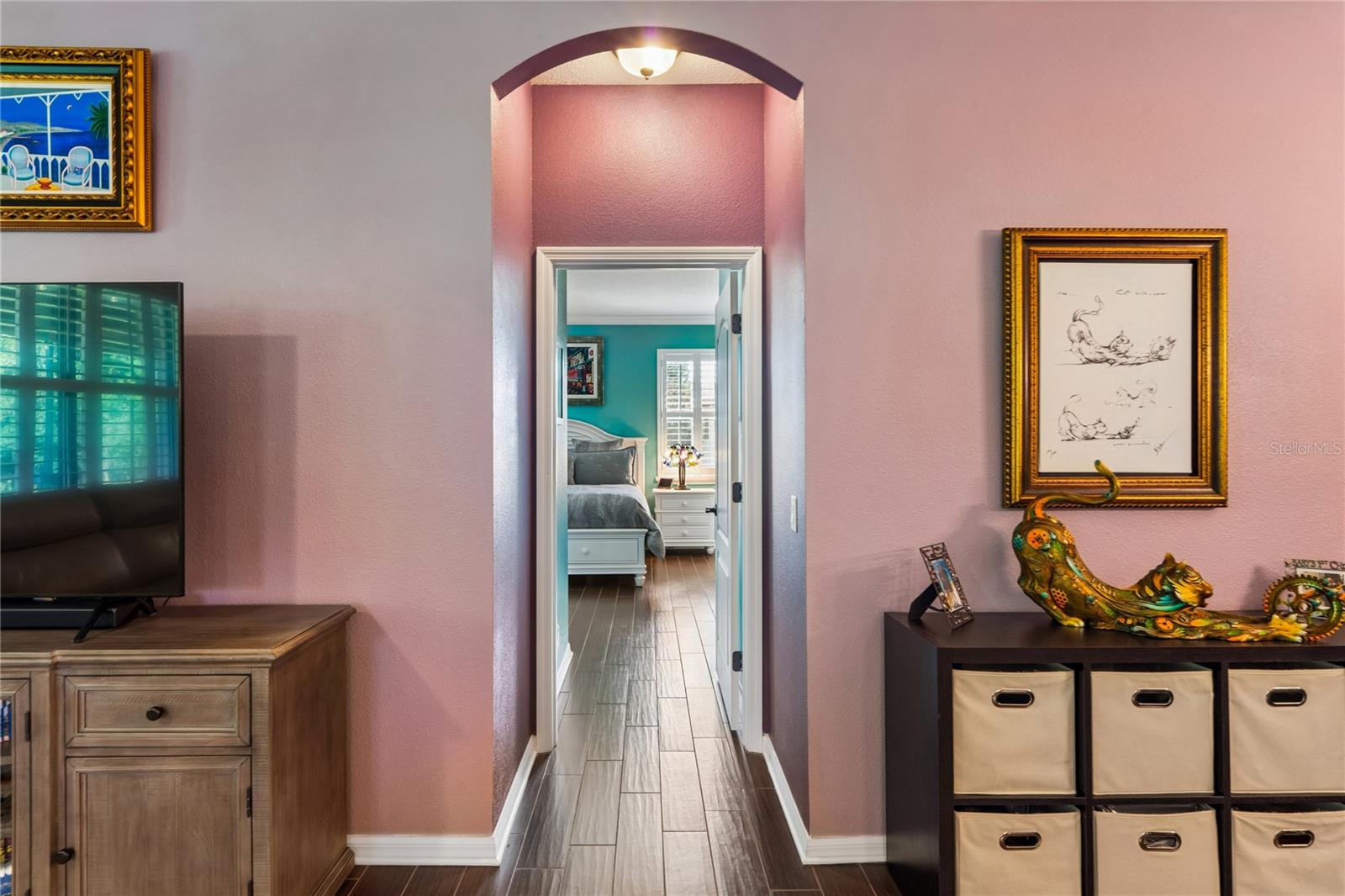 A Separate Hallway Leads You to the Private Primary Bedroom and En Suite