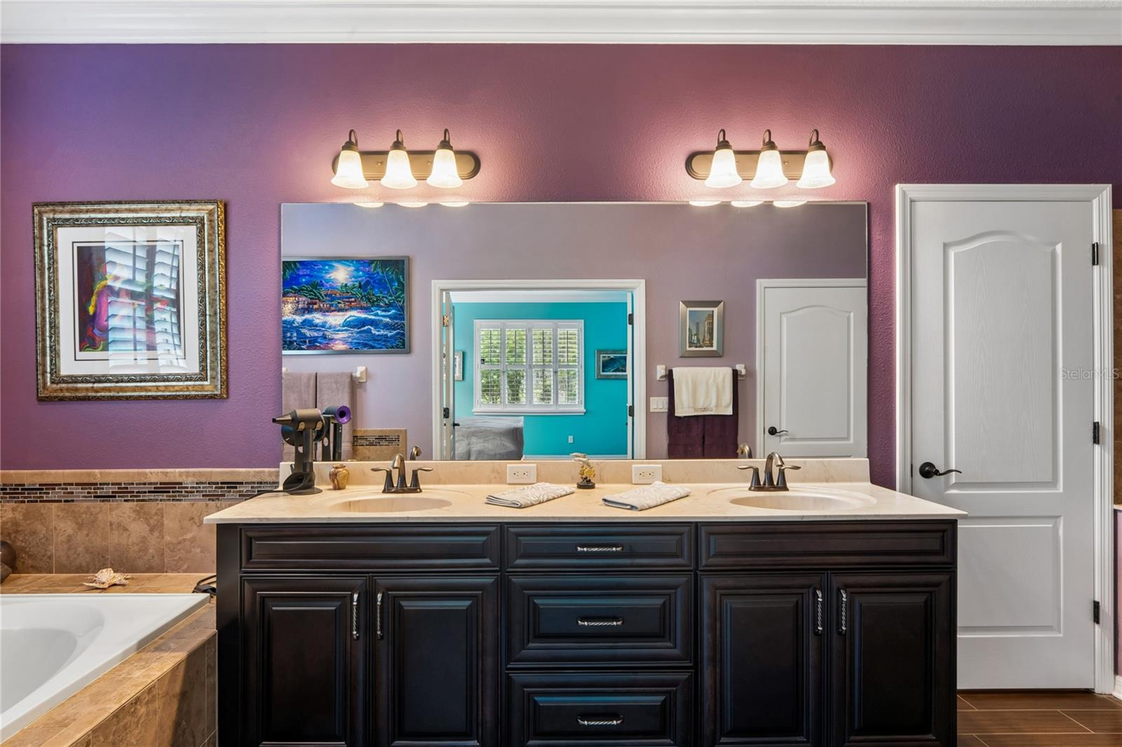 Double Sinks and Ample Storage Drawers in the En Suite