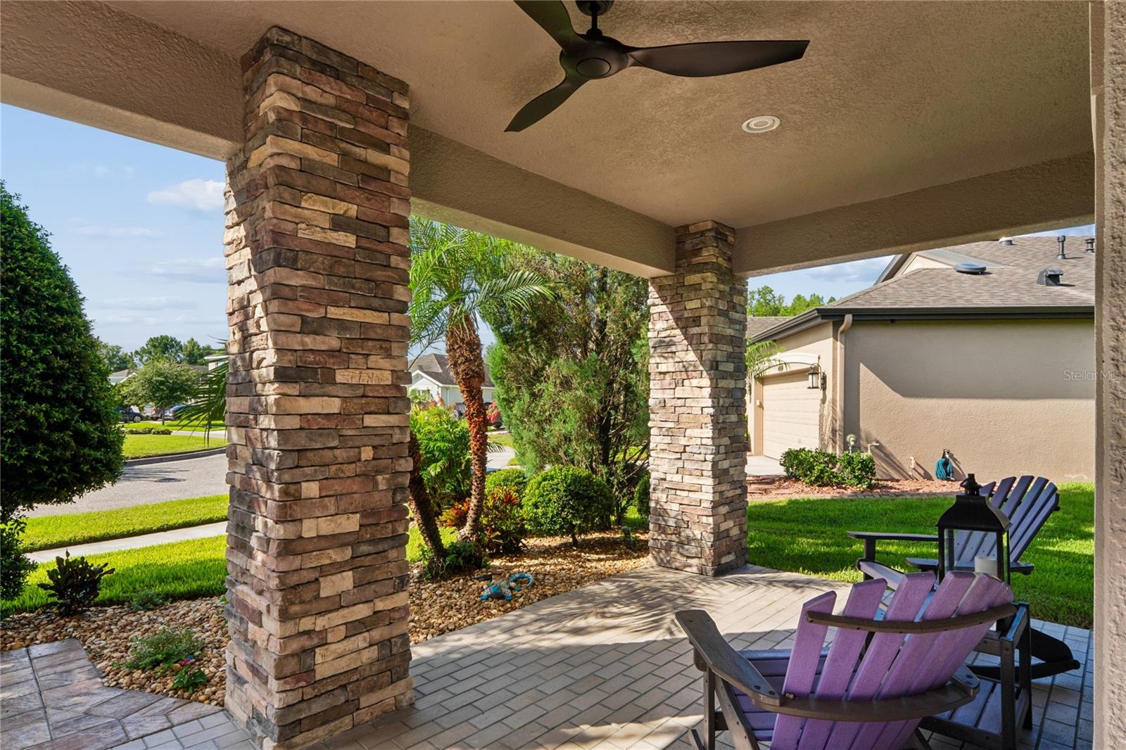 Enjoy the View from the Large Front Patio, Fully Equipped with Lighting and a Fan to Keep you Cool.