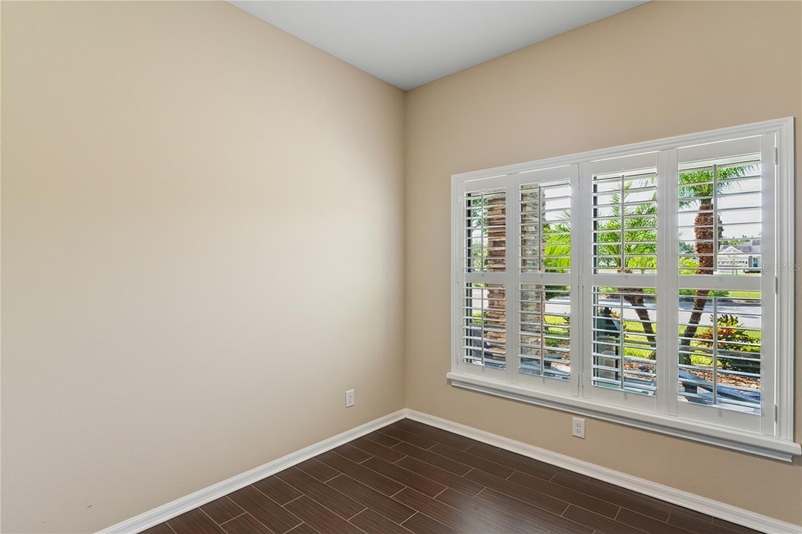 Third Bedroom with Matching Ceramic Tile That Runs Throughout the Home