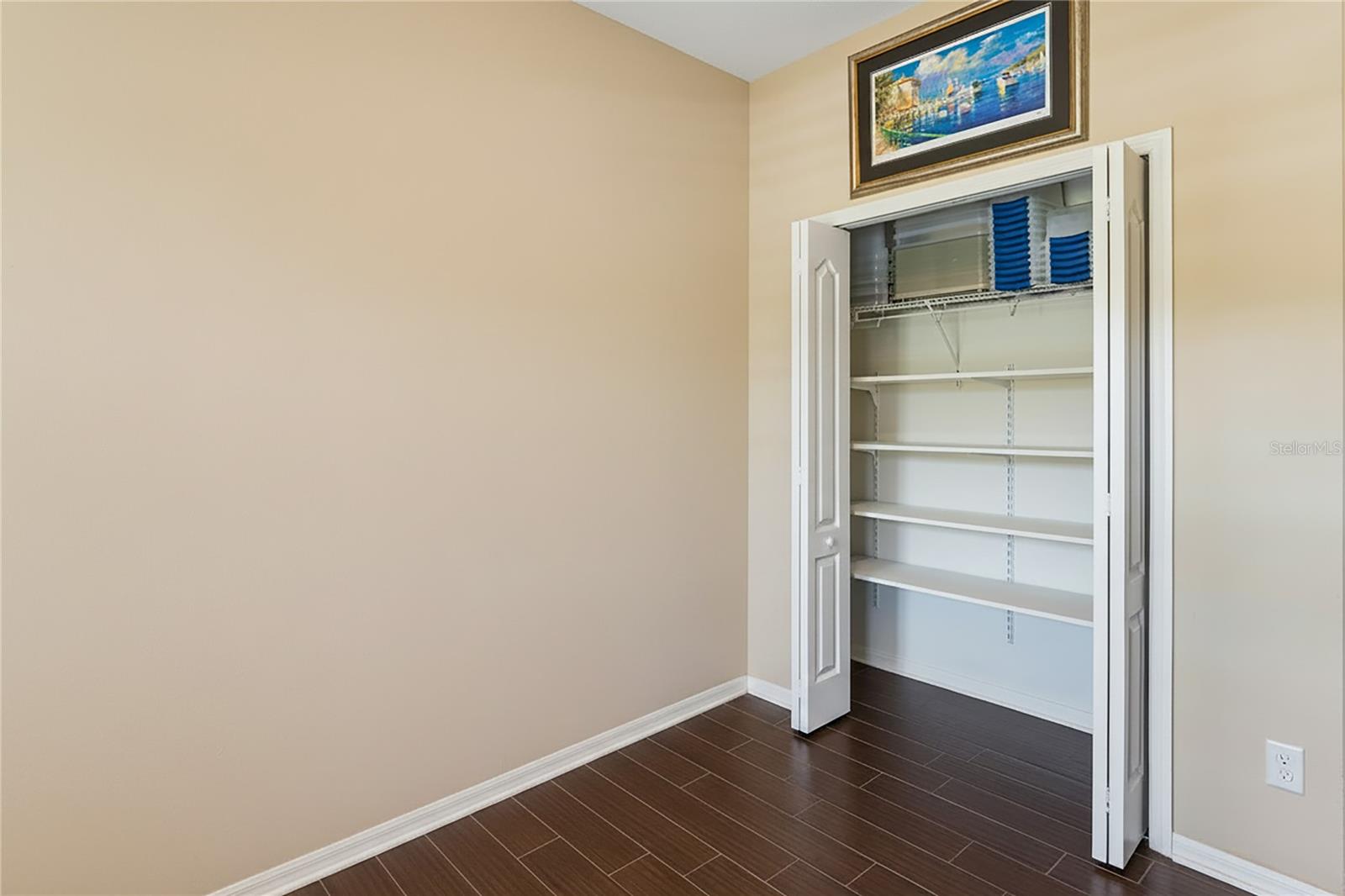 Third Bedroom with Custom Shelving that is easily moved around to suit your needs