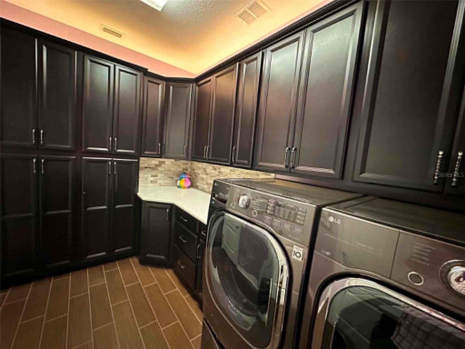 Upgraded Custom Cabinetry with Top and Under Cabinetry Lighting