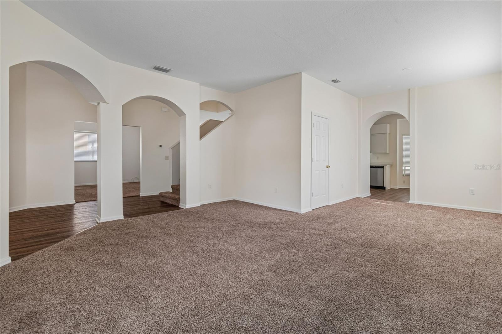 Family Room looking towards office/den on one side and kitchen on the other