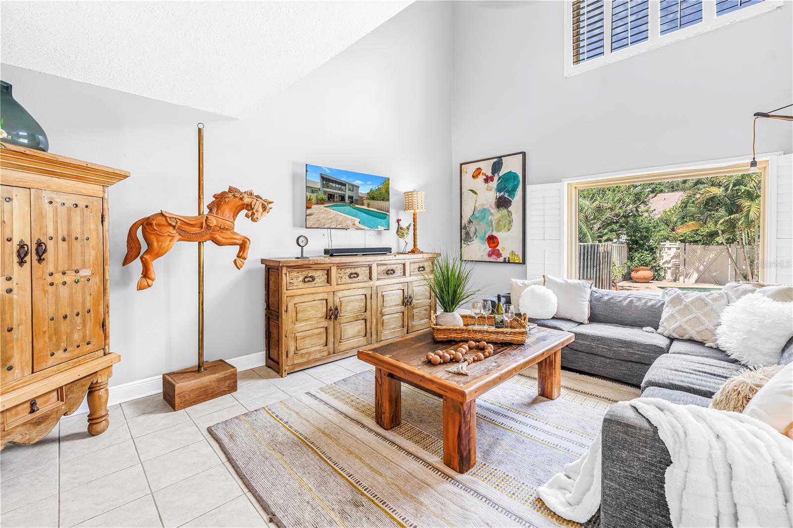 Soaring Ceilings, Loads of windows and natural light.  Lots of space for lounging and unwinding in the evening.