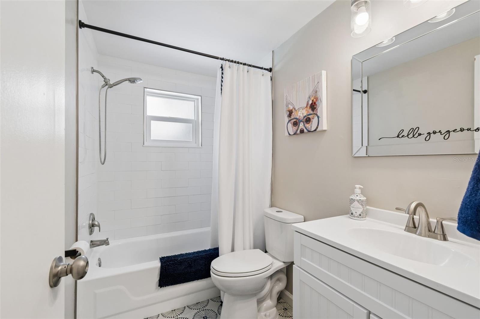 Guest bathroom also part of the 2021 enhancements with new vanity and finishes and centrally located for living space and additional guest rooms.
