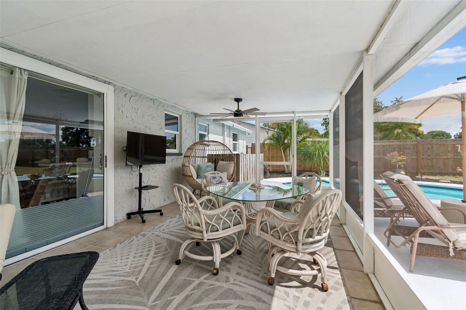On those gorgeous Florida days, the cover patio make for the perfect location for lounging, dining or reading a book while admiring the views of the oversized backyard