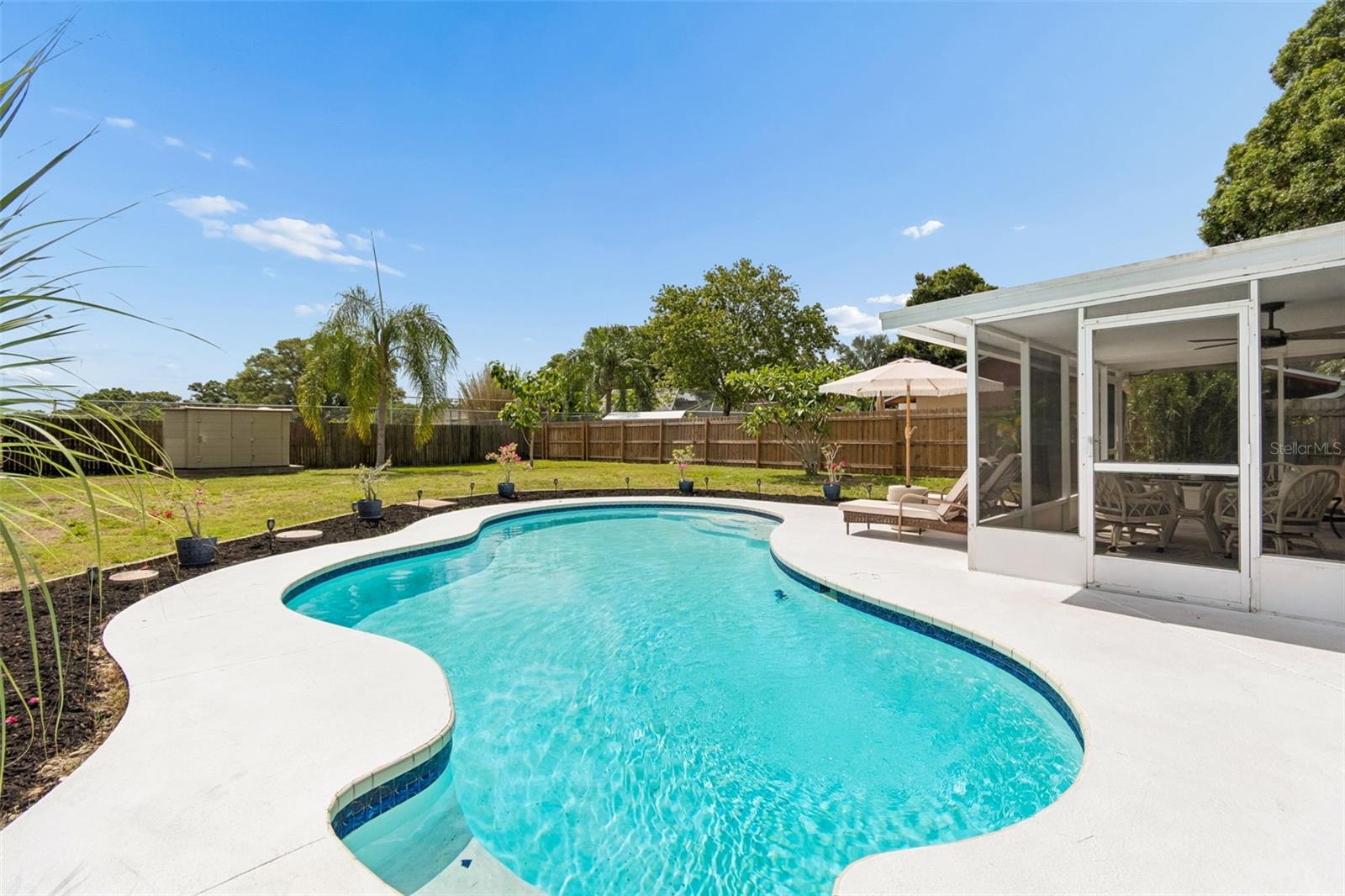 Check out that  expansive pool deck and refresh water views just begging for summer to begin.