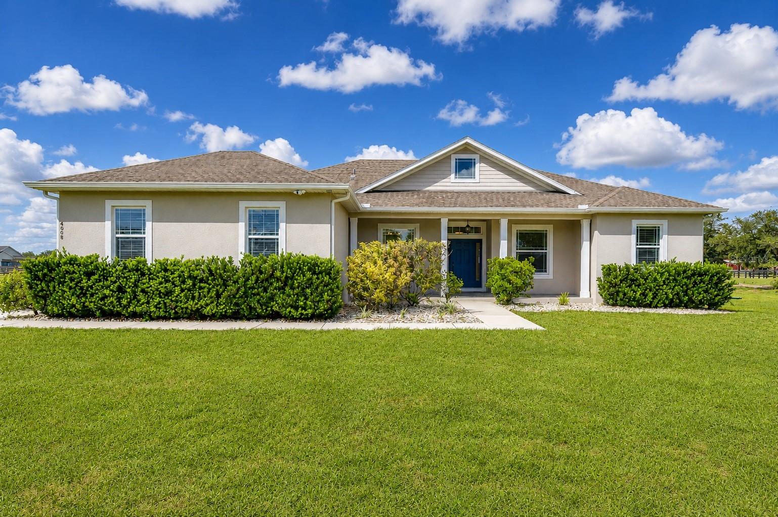 Custom-built country estate by Radd Builders situated on 1.20 fully fenced acres.