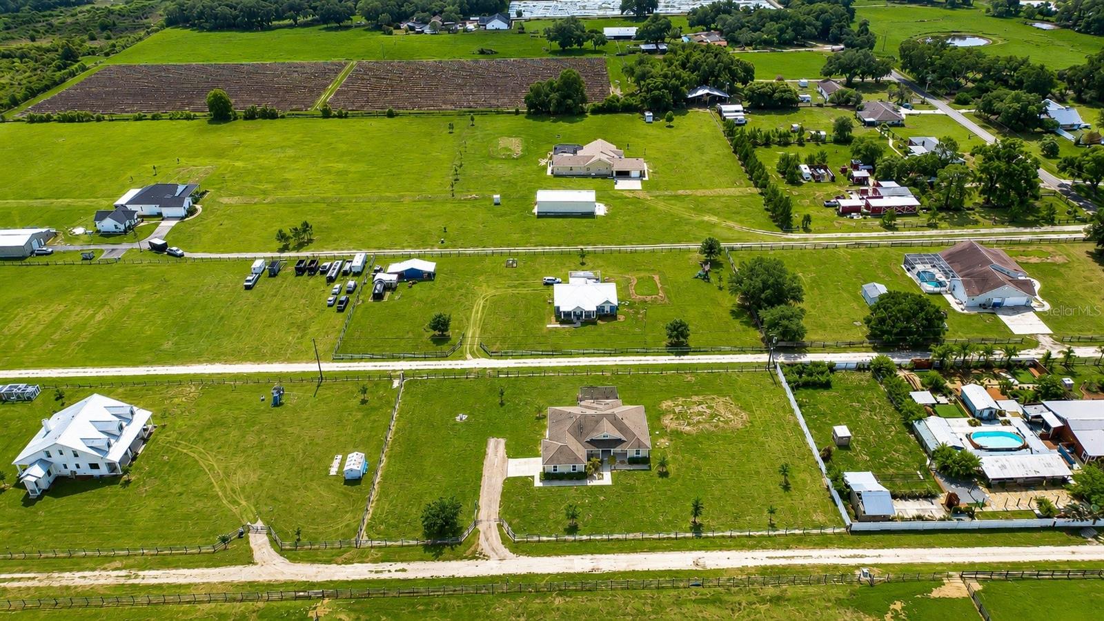 Wide-open property ideal for future pool, barn, RV storage, or boat parking.