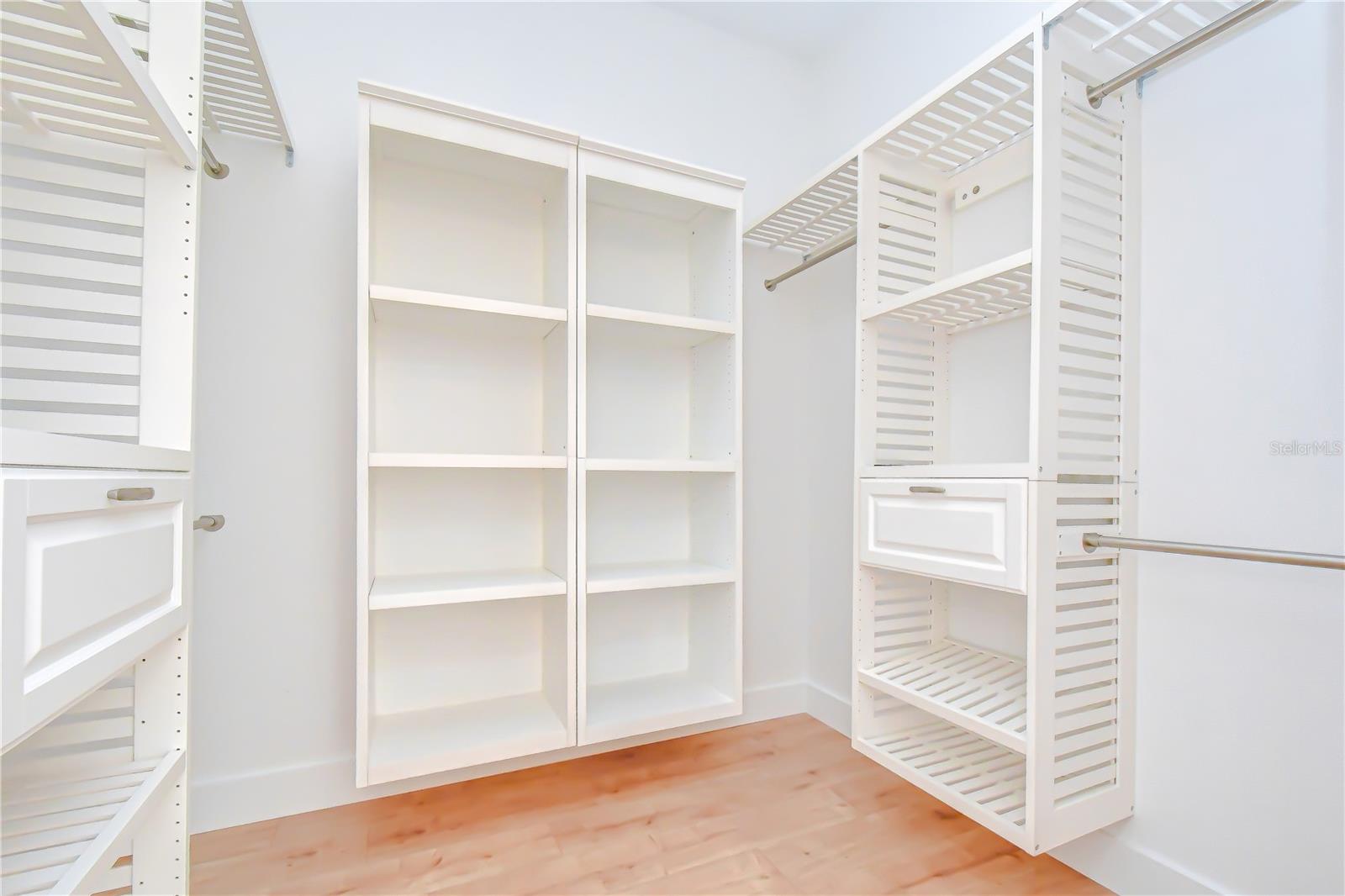 Professionally designed closet maximizing organization and storage.