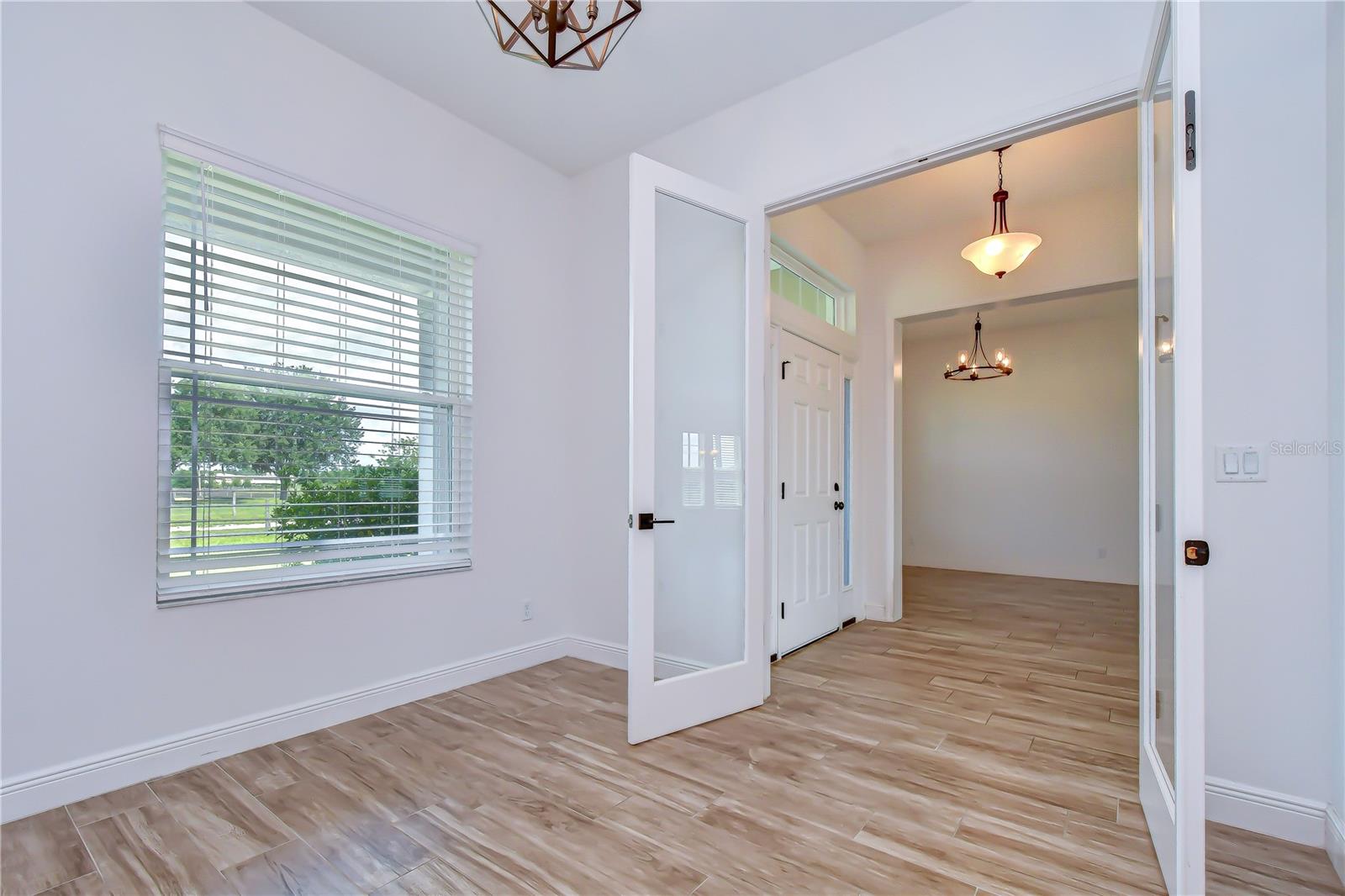 Elegant French door entry providing privacy and style.