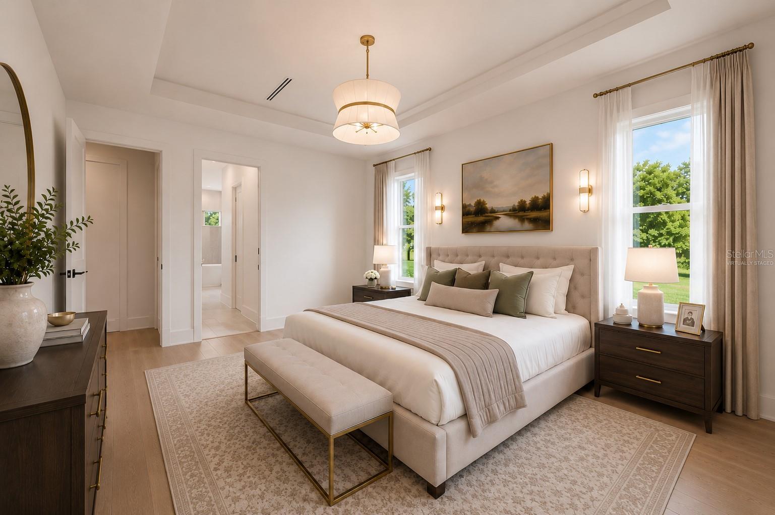 Virtually staged.The luxurious primary suite offers a spa-inspired retreat featuring a freestanding soaking tub, oversized walk-in shower with rain head and handheld shower, premium Italian tile, designer fixtures, and thoughtful custom details throughout.