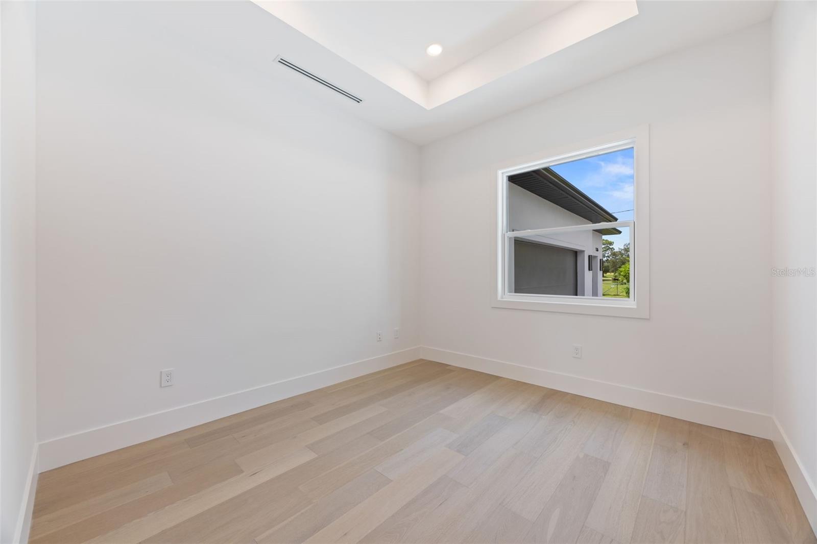 A dedicated office/study room provides the perfect work-from-home space while maintaining privacy from the main living areas.