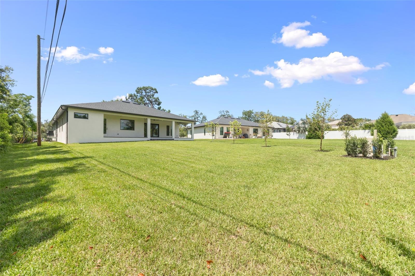 The oversized homesite backing to a conservation area provides a rare combination of privacy, natural beauty, and room to enjoy Florida living at its finest.