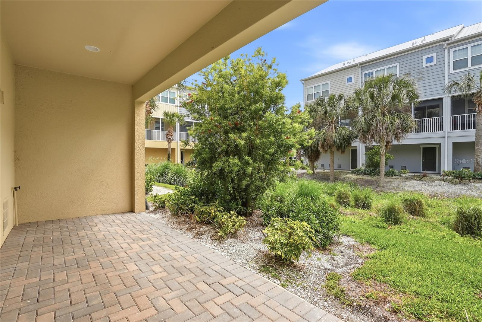 The ground level patio off of the garage can be expanded for more outdoor living space