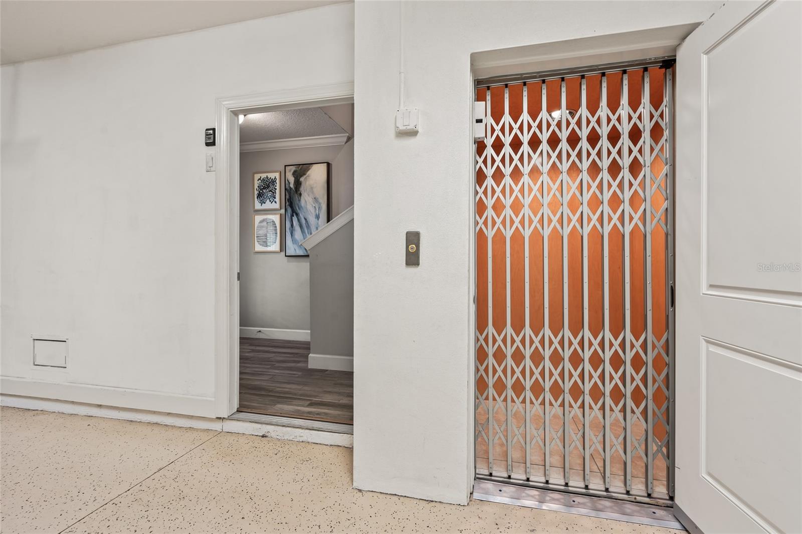 Convenient elevator providing access to all levels. The door opening is the first floor foyer