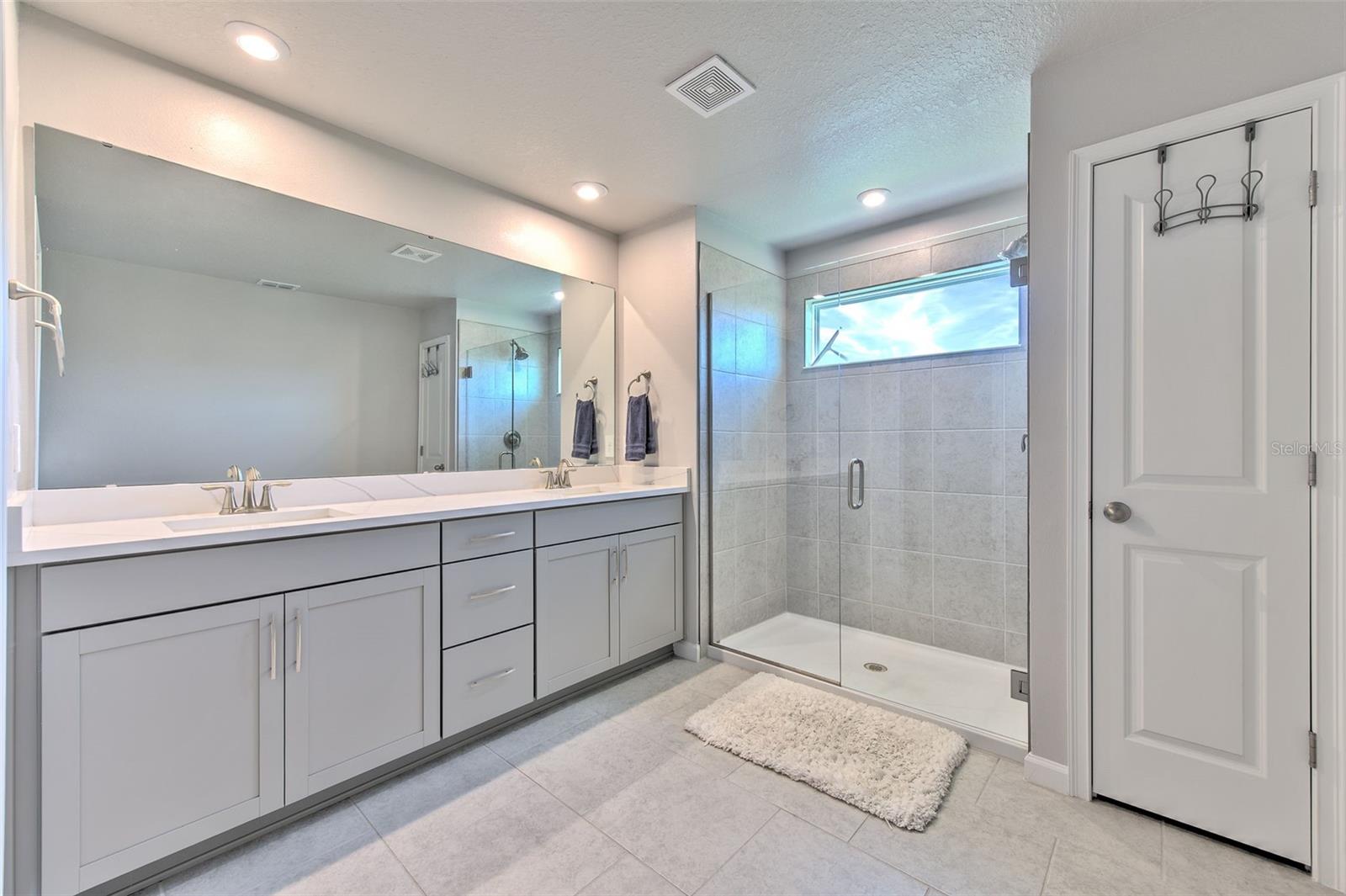 En Suite Bath with Dual Sinks & Shower