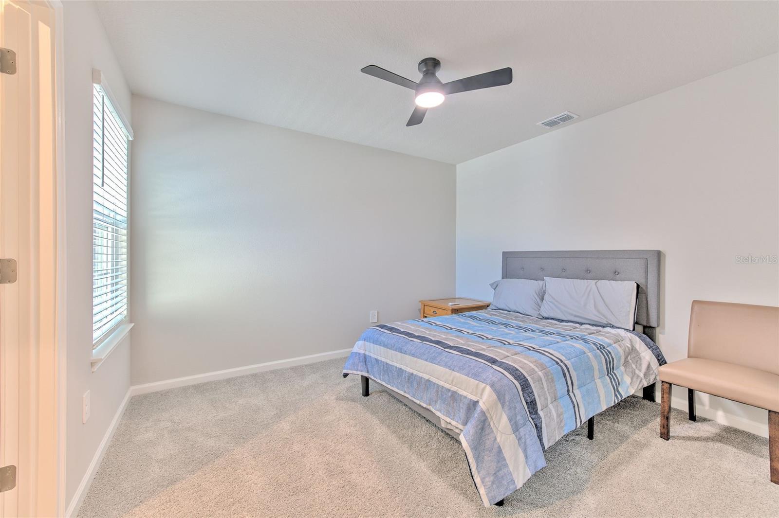 Bedroom 2 with Ceiling Fan & Walk-in Closet