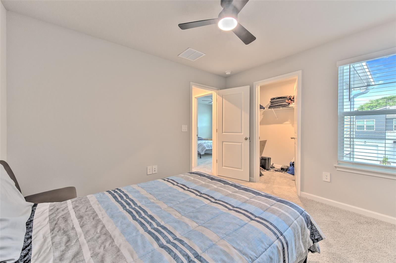 Bedroom 2 with Ceiling Fan & Walk-in Closet