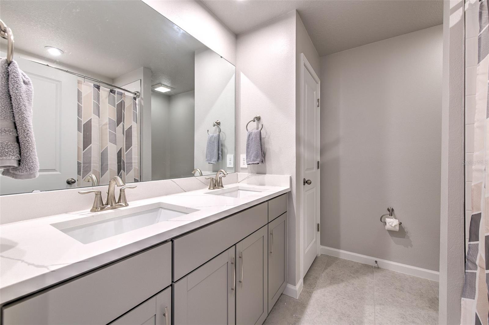 Secondary Bath with Dual Sinks & Tub