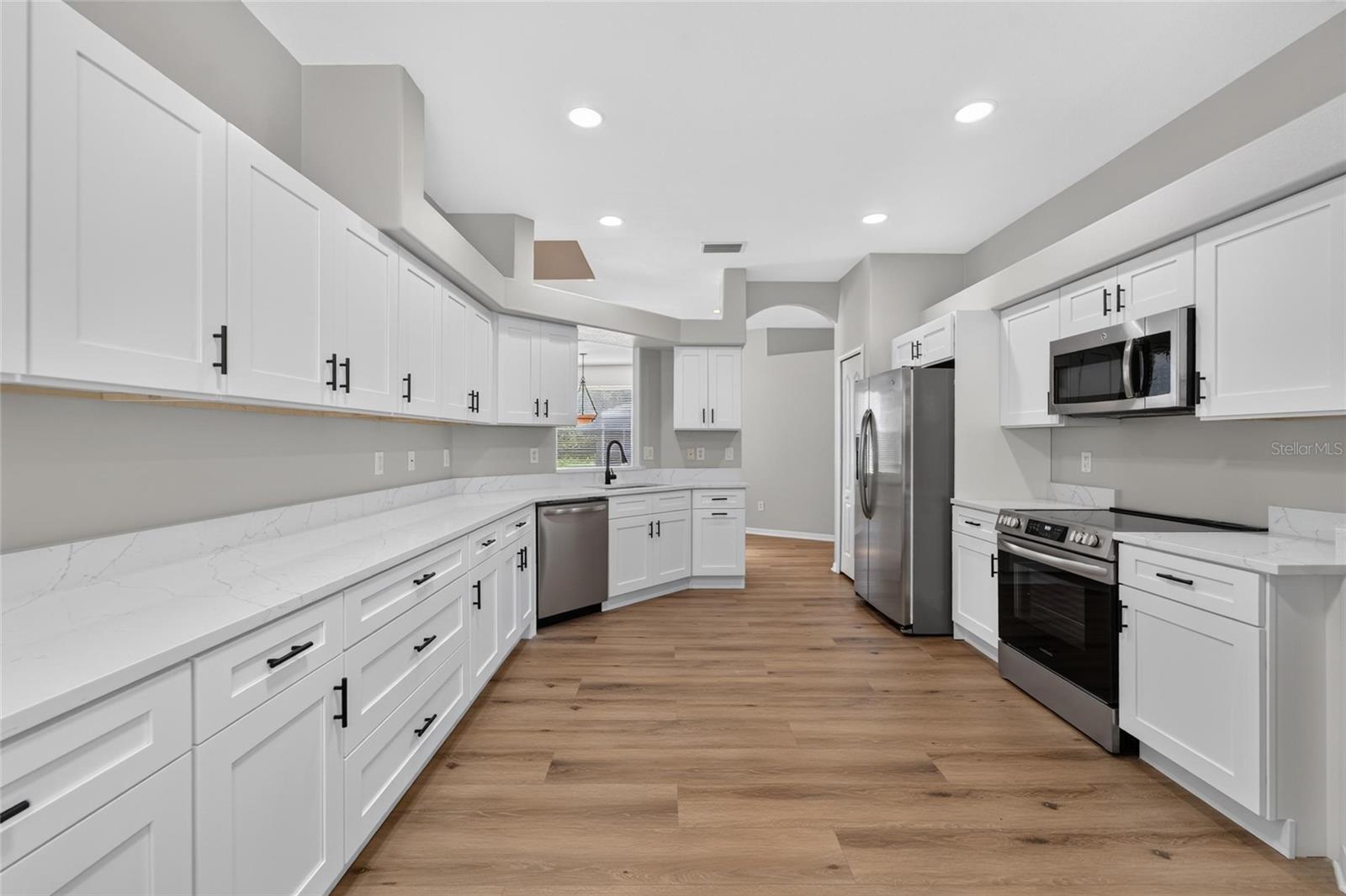 all new cabinets, quartz countertops and luxury vinyl flooring.