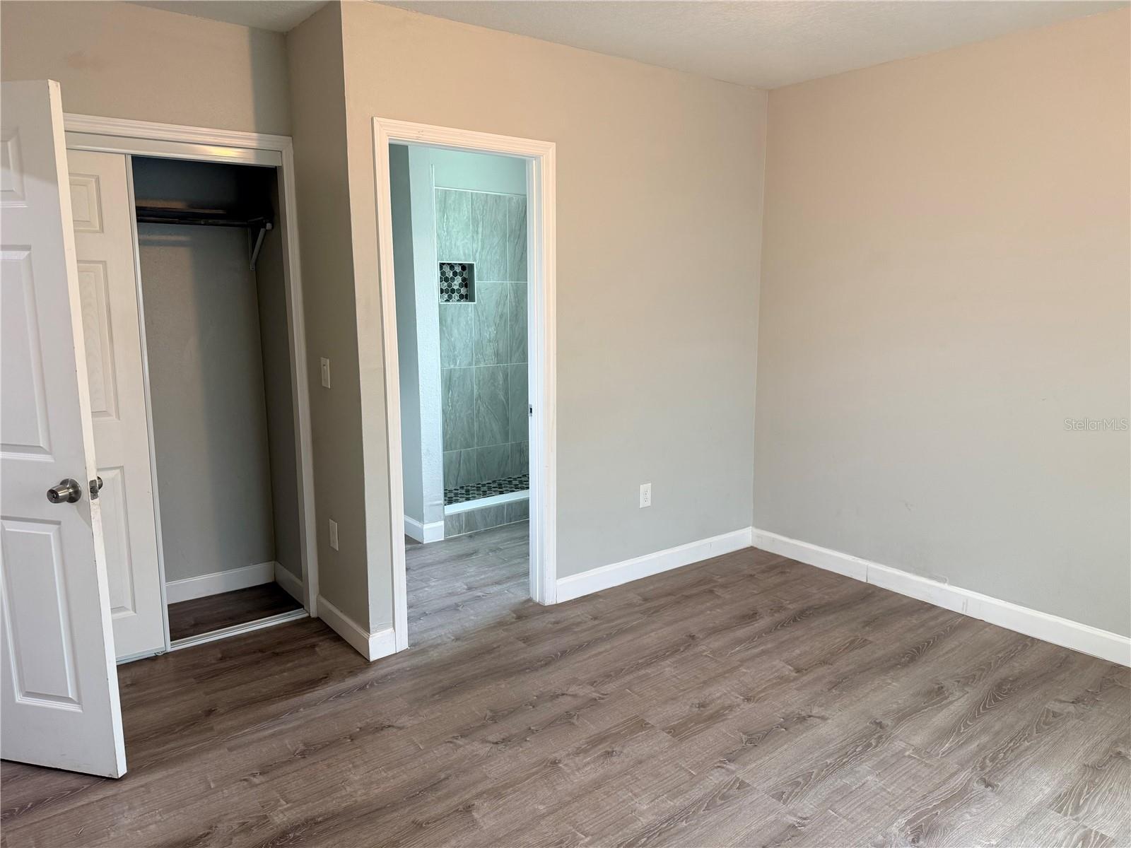 2nd bedroom with ensuite & built in closet.