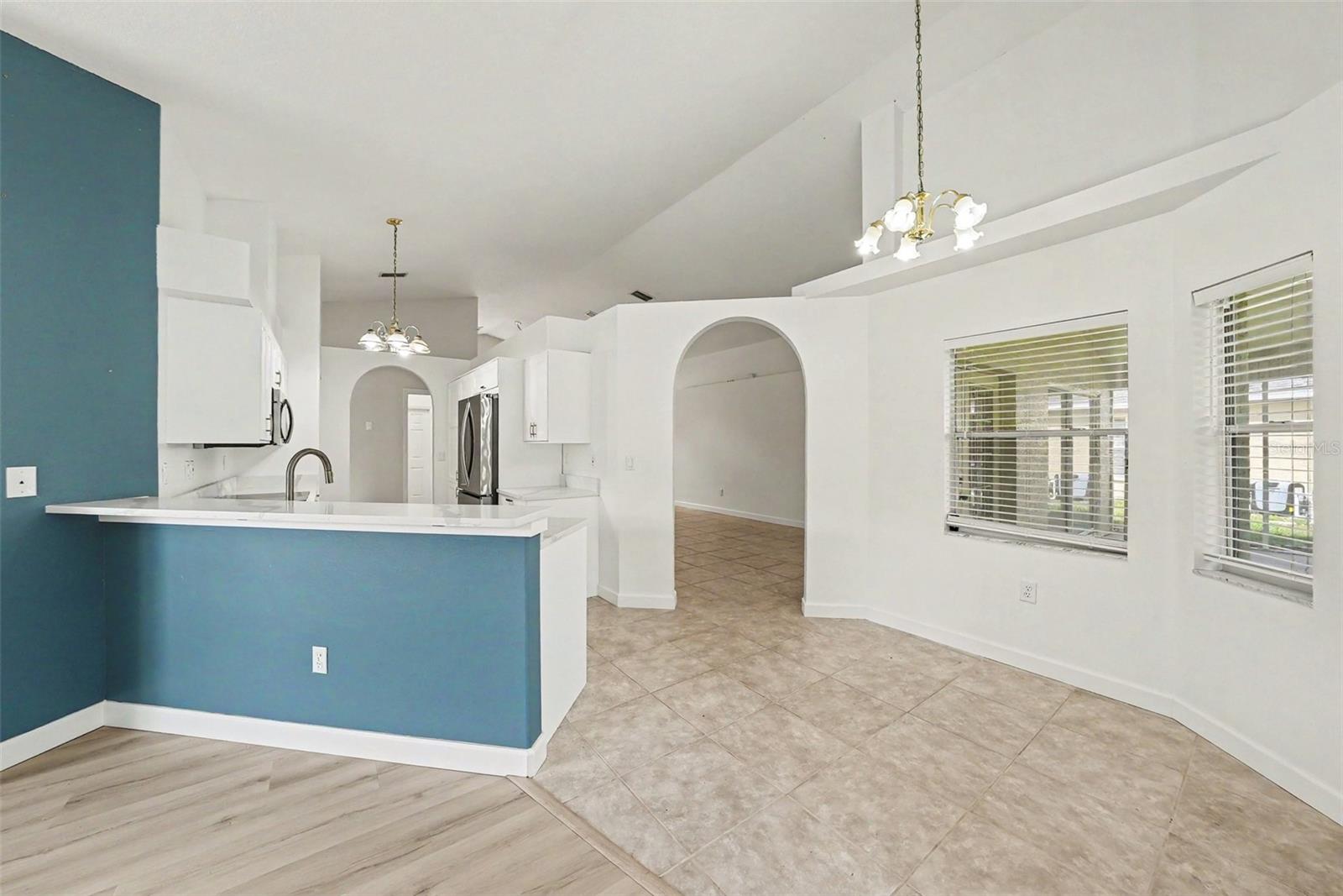 The kitchen overlooks the family room and the breakfast nook
